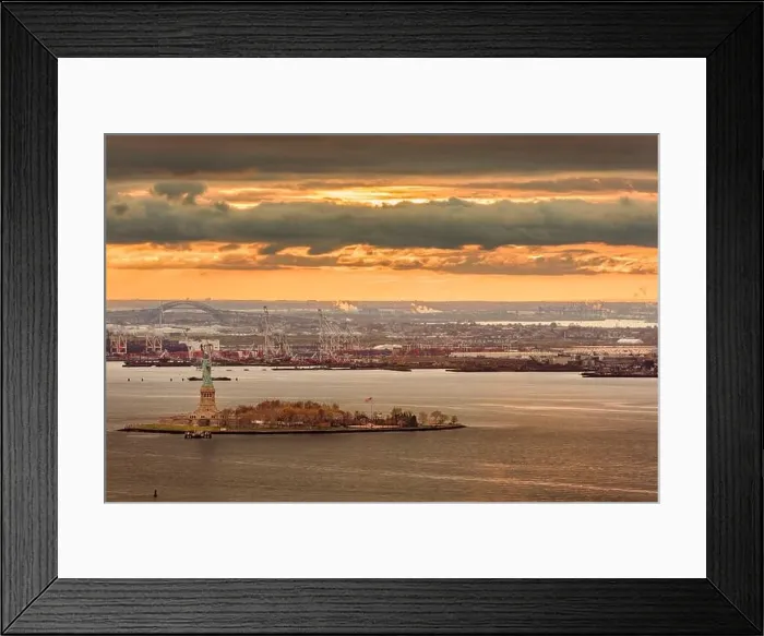 Framed Print : New York Harbor, New York, USA with the statue of liberty and Bayonne, New Jersey in the background Framed Print : New York Harbor, New York, USA with the statue of liberty and Bayonne, New Jersey in the background