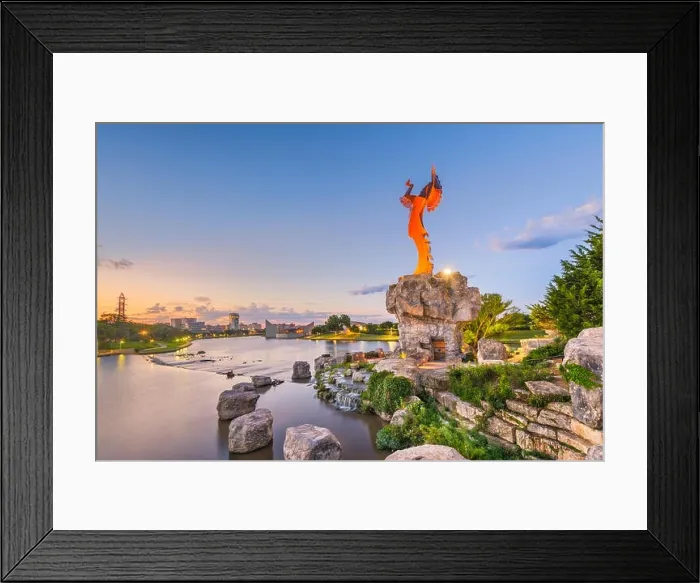 Framed Print : WICHITA, KANSAS - AUGUS 31, 2018: The confluence of the Arkansas and Little Arkansas River at the Keeper of the Plains near downtown Wichita at dawn Framed Print : WICHITA, KANSAS - AUGUS 31, 2018: The confluence of the Arkansas and Little Arkansas River at the Keeper of the Plains near downtown Wichita at dawn