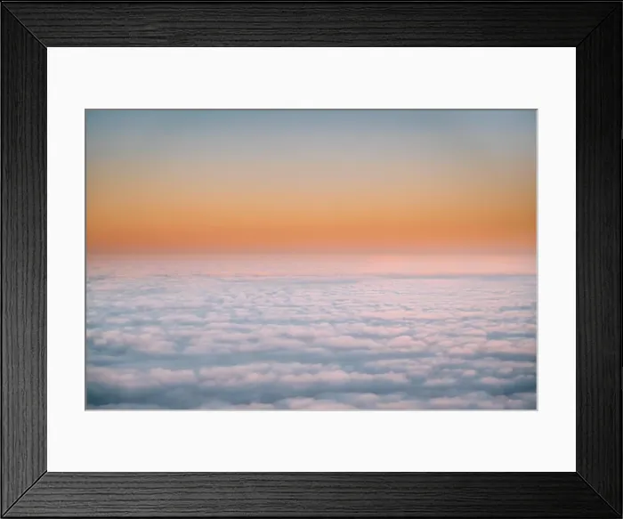 Framed Print : Beautiful Aerial View Of Sunny Clear Sky Over White Fluffy Clouds From Height Flight Of Plane. Bright Orange And Yellow Colors Of Sunny Sky. Natural B Framed Print : Beautiful Aerial View Of Sunny Clear Sky Over White Fluffy Clouds From Height Flight Of Plane. Bright Orange And Yellow Colors Of Sunny Sky. Natural B