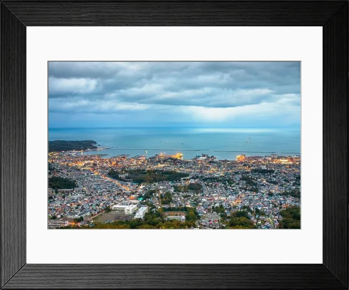 Framed Print : Otaru, Hokkaido, Japan town cityscape over Ishikari Bay at dusk Framed Print : Otaru, Hokkaido, Japan town cityscape over Ishikari Bay at dusk