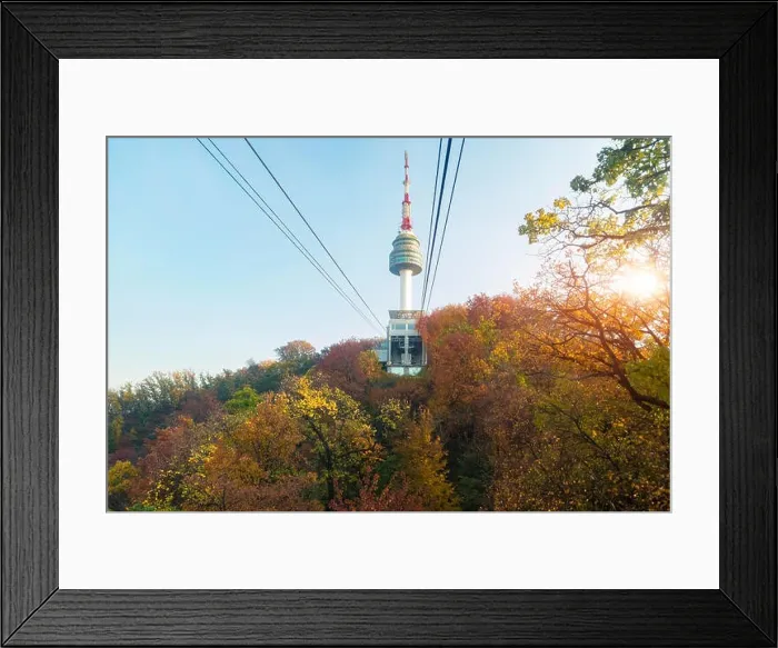 Framed Print : Namsan N Seoul Tower with the line of cable car at the sunset time in autumn at Seoul, South Korea Framed Print : Namsan N Seoul Tower with the line of cable car at the sunset time in autumn at Seoul, South Korea