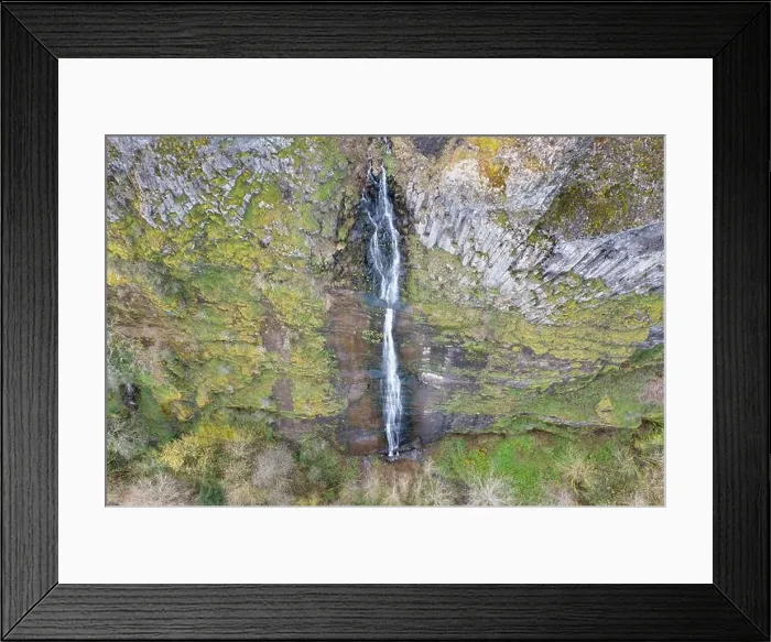 Framed Print : A waterfall flows over a cliff into the Columbia River Gorge in Oregon. This canyon, with the Columbia River flowing through it, is 80 miles long Framed Print : A waterfall flows over a cliff into the Columbia River Gorge in Oregon. This canyon, with the Columbia River flowing through it, is 80 miles long
