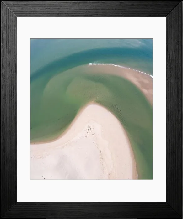 Framed Print : The cold water of the Atlantic Ocean washes onto a beautiful sandy beach on Cape Cod, Massachusetts. This scenic peninsula is a popular vacation area Framed Print : The cold water of the Atlantic Ocean washes onto a beautiful sandy beach on Cape Cod, Massachusetts. This scenic peninsula is a popular vacation area