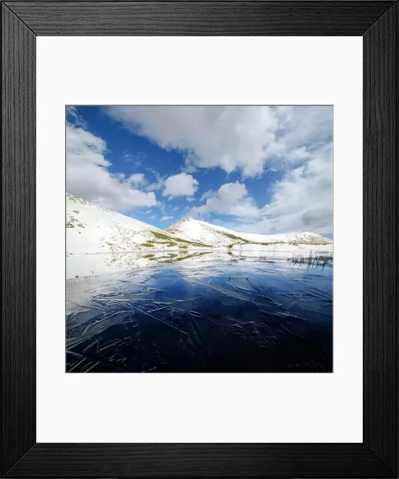 Framed Print : Frozen mountain lake with blue ice Framed Print : Frozen mountain lake with blue ice