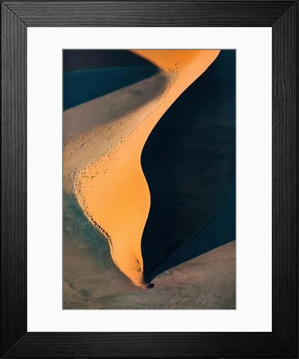 Framed Print : Contrasted abstract of the Oxide rich red sand dunes in the great sand sea of Namibia Framed Print : Contrasted abstract of the Oxide rich red sand dunes in the great sand sea of Namibia