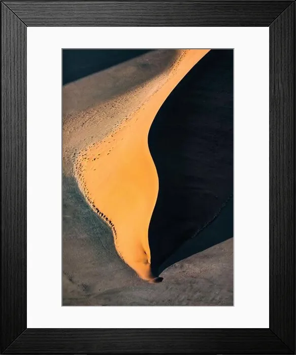 Framed Print : Contrasted abstract of the Oxide rich red sand dunes in the great sand sea of Namibia Framed Print : Contrasted abstract of the Oxide rich red sand dunes in the great sand sea of Namibia