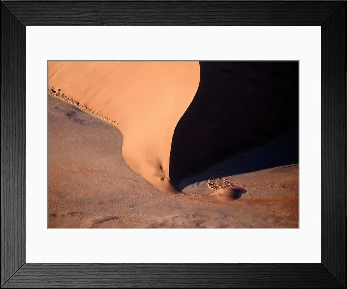 Framed Print : Contrasted abstract of the Oxide rich red sand dunes in the great sand sea of Namibia Framed Print : Contrasted abstract of the Oxide rich red sand dunes in the great sand sea of Namibia
