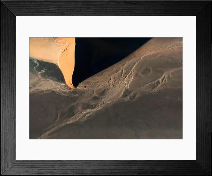 Framed Print : Contrasted abstract of the Oxide rich red sand dunes in the great sand sea of Namibia Framed Print : Contrasted abstract of the Oxide rich red sand dunes in the great sand sea of Namibia