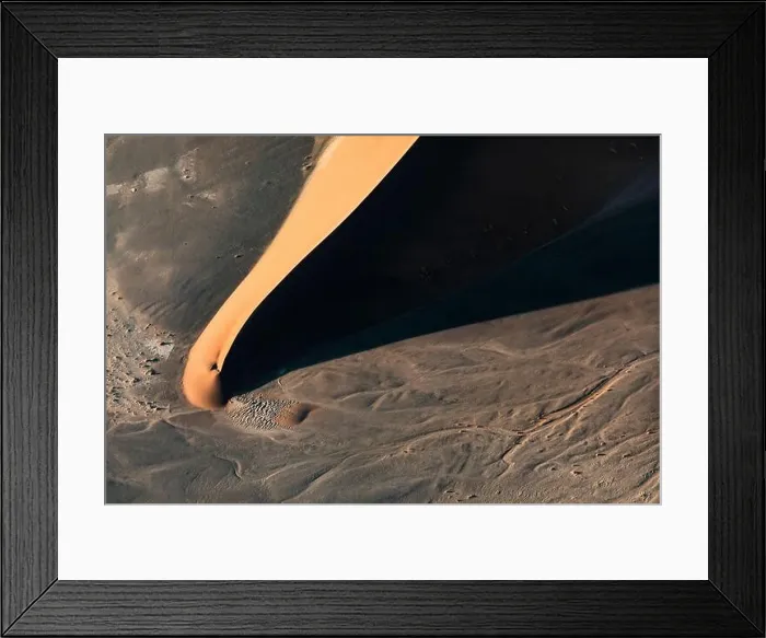 Framed Print : Contrasted abstract of the Oxide rich red sand dunes in the great sand sea of Namibia Framed Print : Contrasted abstract of the Oxide rich red sand dunes in the great sand sea of Namibia