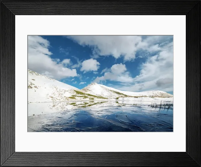 Framed Print : Frozen mountain lake with blue ice Framed Print : Frozen mountain lake with blue ice