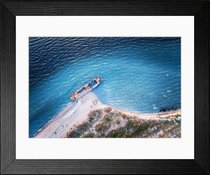 Framed Print : Old shipwreck reinforced concrete barge abandoned stand on beach on the coast of Black sea in Ukraine Framed Print : Old shipwreck reinforced concrete barge abandoned stand on beach on the coast of Black sea in Ukraine