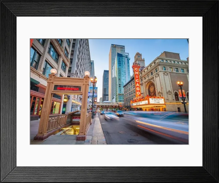 Framed Print : CHICAGO, ILLINOIS - MAY 10, 2018: The landmark Chicago Theatre on State Street at twilight. The historic theater dates from 1921 Framed Print : CHICAGO, ILLINOIS - MAY 10, 2018: The landmark Chicago Theatre on State Street at twilight. The historic theater dates from 1921