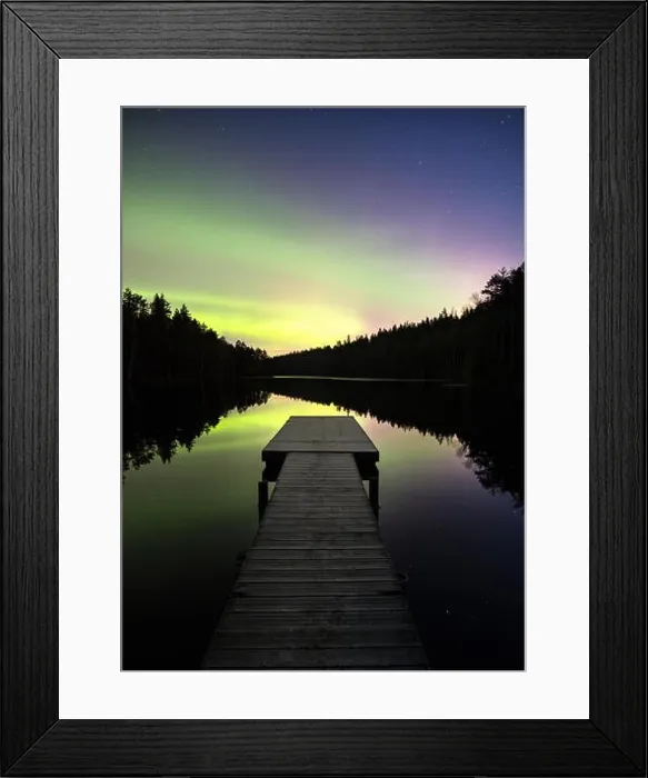 Framed Print : Scenic aurora borealis with nice reflections and pier at night in Finland Framed Print : Scenic aurora borealis with nice reflections and pier at night in Finland