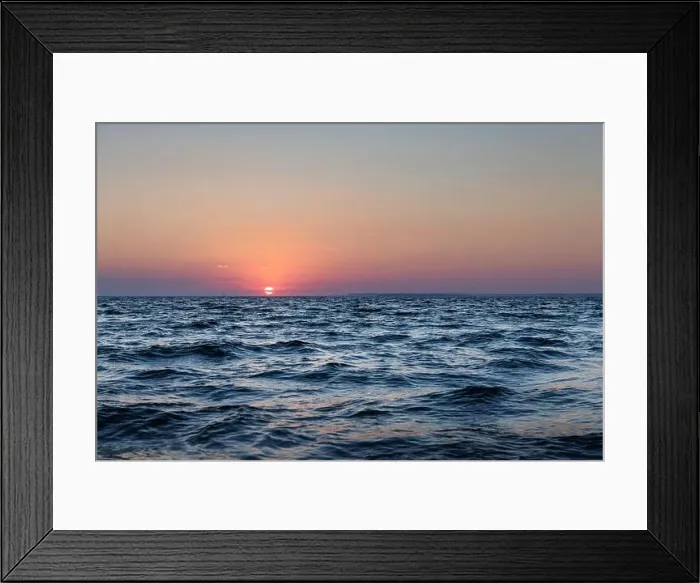 Framed Print : Sunset in the ocean with large sun dusk soft waves and red cloudy sky. Sea sunrise background. Landscape photography