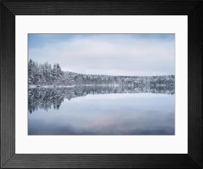 Framed Print : Scenic landscape with forest and lake at winter evening in Finland Framed Print : Scenic landscape with forest and lake at winter evening in Finland