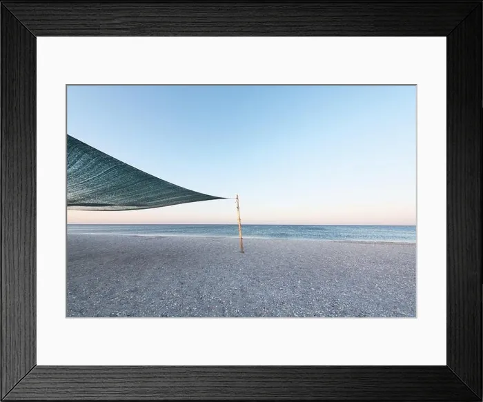 Framed Print : Shelter from the sun on tropical beach sand and blue sea water. Vacations background Framed Print : Shelter from the sun on tropical beach sand and blue sea water. Vacations background