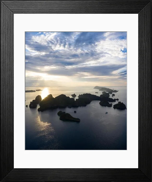 Framed Print : Remote limestone islands in Raja Ampat, Indonesia, are surrounded by healthy coral reefs. This biodiverse region is known for its marine biodiversity Framed Print : Remote limestone islands in Raja Ampat, Indonesia, are surrounded by healthy coral reefs. This biodiverse region is known for its marine biodiversity