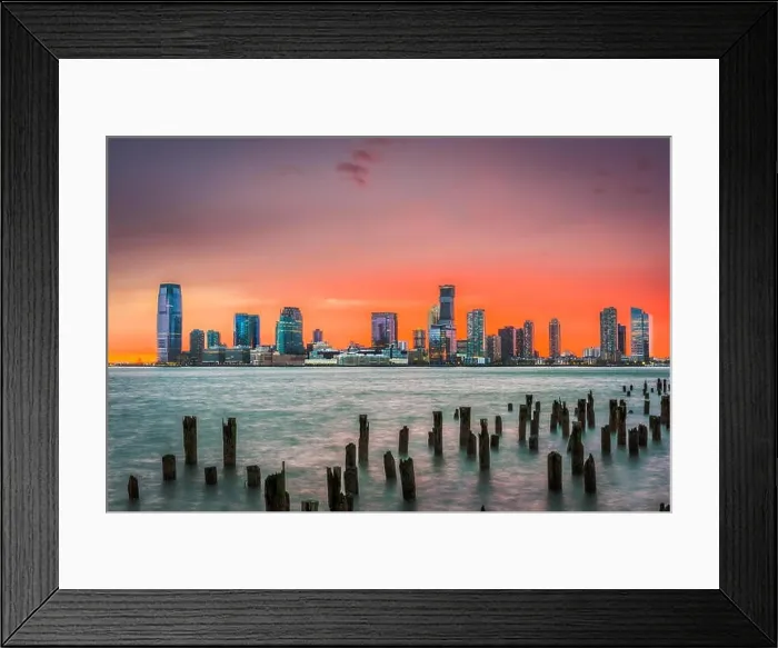 Framed Print : Jersey City, New Jersey, USA skyline across the Hudson River after sunset Framed Print : Jersey City, New Jersey, USA skyline across the Hudson River after sunset