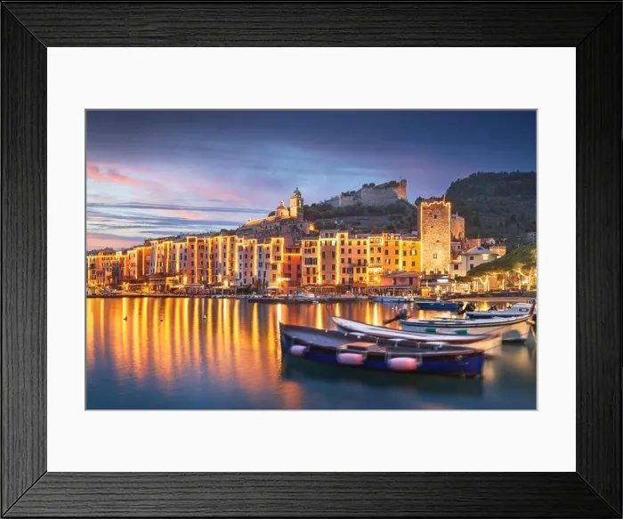Framed Print : Porto Venere, La Spezia, Italy historic town skyline with Christmas lights at dusk Framed Print : Porto Venere, La Spezia, Italy historic town skyline with Christmas lights at dusk