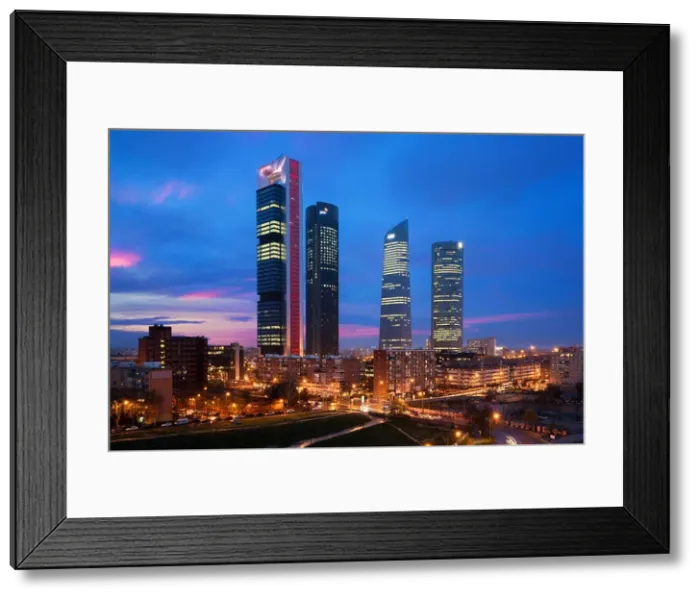 Framed Print : Madrid Four Towers financial district skyline at twilight in Madrid, Spain Framed Print : Madrid Four Towers financial district skyline at twilight in Madrid, Spain
