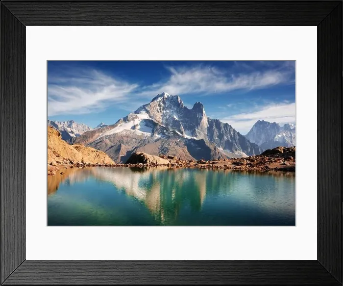 Framed Print : Incredible view of clear water and sky reflection on Lac Blanc lake in France Alps. Monte Bianco mountains range on background Framed Print : Incredible view of clear water and sky reflection on Lac Blanc lake in France Alps. Monte Bianco mountains range on background