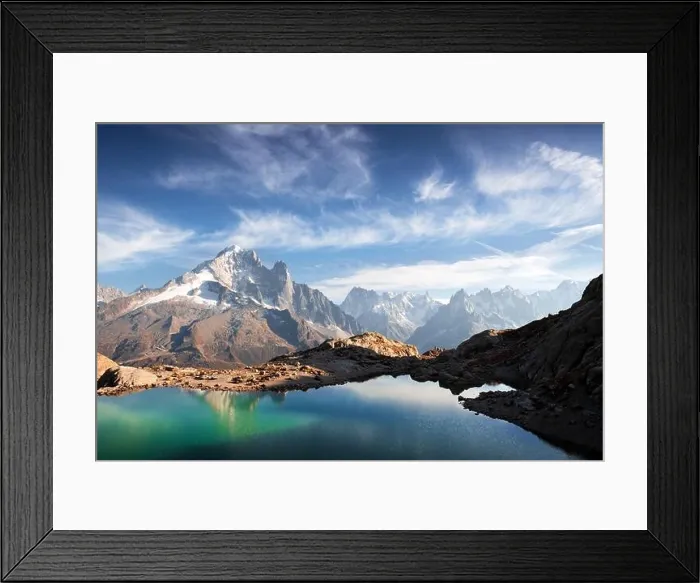 Framed Print : Incredible view of clear water and sky reflection on Lac Blanc lake in France Alps. Monte Bianco mountains range on background Framed Print : Incredible view of clear water and sky reflection on Lac Blanc lake in France Alps. Monte Bianco mountains range on background