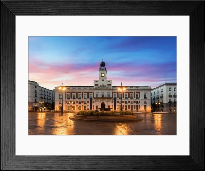 Framed Print : Puerta del Sol square is the main public space in Madrid. In the middle of the square is located the office of the President of the Community of Madri Framed Print : Puerta del Sol square is the main public space in Madrid. In the middle of the square is located the office of the President of the Community of Madri