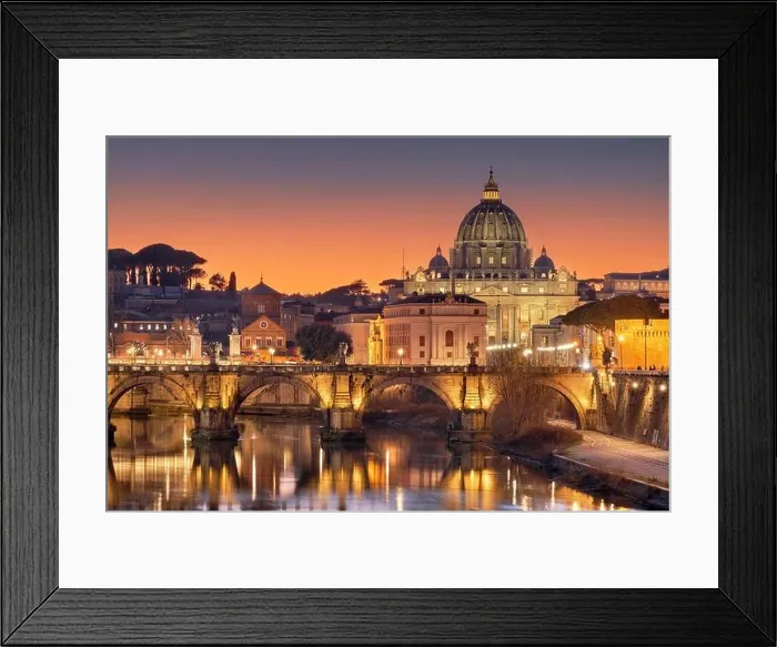 Framed Print : St. Peter's Basilica in Vatican City on the Tiber River through Rome, Italy at dusk Framed Print : St. Peter's Basilica in Vatican City on the Tiber River through Rome, Italy at dusk