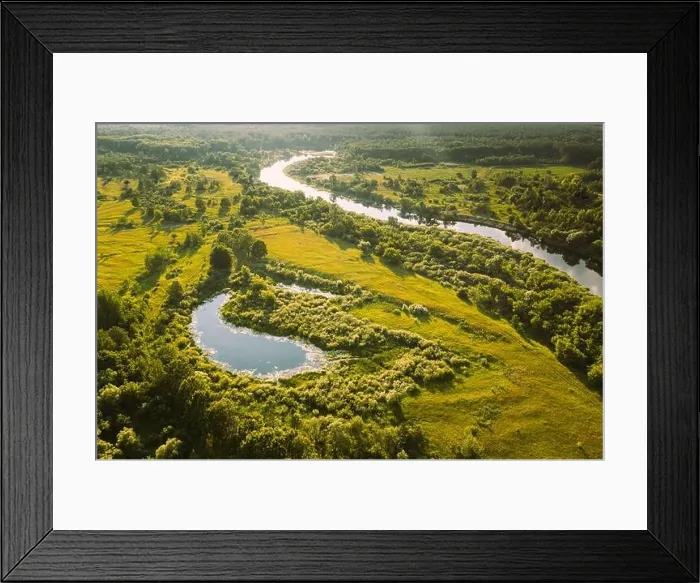 Framed Print : Belarus. Elevated View Of Small Bog Marsh Swamp Wetland, River And Green Forest Landscape In Sunny Summer Day. Attitude View. Forest In Bird's Eye Framed Print : Belarus. Elevated View Of Small Bog Marsh Swamp Wetland, River And Green Forest Landscape In Sunny Summer Day. Attitude View. Forest In Bird's Eye