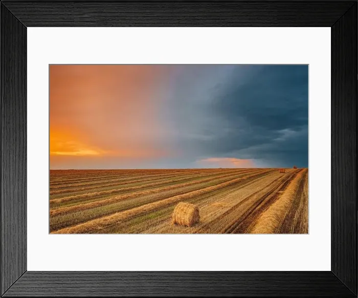 Framed Print : Aerial View Of Sunset Bright Sky Above Summer Hay Field Landscape In Evening. Haystack, Hay Roll in Sunrise time Framed Print : Aerial View Of Sunset Bright Sky Above Summer Hay Field Landscape In Evening. Haystack, Hay Roll in Sunrise time
