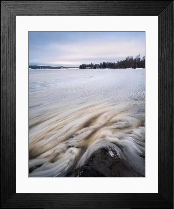 Framed Print : Ice shapes with melted lake at winter landscape in Finland Framed Print : Ice shapes with melted lake at winter landscape in Finland