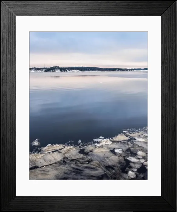 Framed Print : Ice shapes with melted lake at winter landscape in Finland Framed Print : Ice shapes with melted lake at winter landscape in Finland