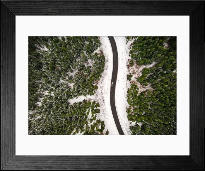 Framed Print : Flight over the winter mountains with road serpentine and snowy forest. Top down view. Landscape photography Framed Print : Flight over the winter mountains with road serpentine and snowy forest. Top down view. Landscape photography