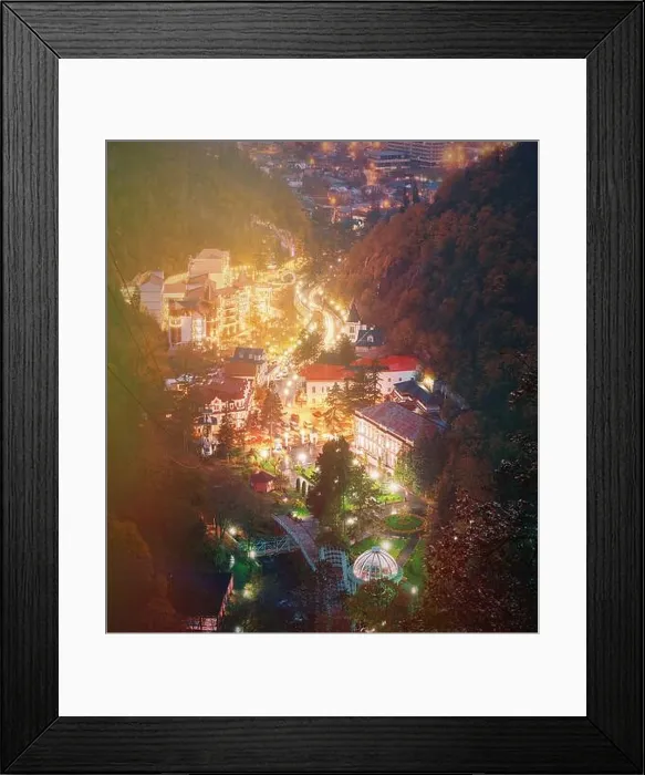 Framed Print : Borjomi, Samtskhe-Javakheti, Georgia. Aerial View Borjomi Cityscape And Central Park In Autumn October Evening Night In Night Illuminations Lights Framed Print : Borjomi, Samtskhe-Javakheti, Georgia. Aerial View Borjomi Cityscape And Central Park In Autumn October Evening Night In Night Illuminations Lights