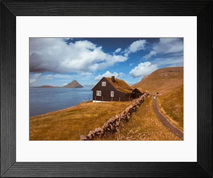 Framed Print : Foggy morning view of a house with typical turf-top grass roof in the Velbastadur village on Streymoy island, Faroe islands, Denmark Framed Print : Foggy morning view of a house with typical turf-top grass roof in the Velbastadur village on Streymoy island, Faroe islands, Denmark