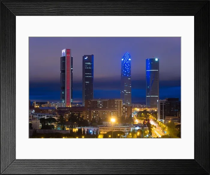 Framed Print : Madrid cityscape at night. Landscape of Madrid business building at Four Tower. Modern high building in business district area at Spain Framed Print : Madrid cityscape at night. Landscape of Madrid business building at Four Tower. Modern high building in business district area at Spain