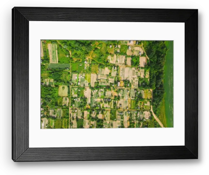 Framed Print : Aerial View Of Vegetable Gardens In Small Town Or Village. Skyline In Summer Evening. Village Garden Beds In Bird's-eye View Framed Print : Aerial View Of Vegetable Gardens In Small Town Or Village. Skyline In Summer Evening. Village Garden Beds In Bird's-eye View
