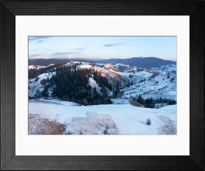 Framed Print : Amazing aerial view of mountains range and meadows of the countryside in spring time. Dramatic sky Framed Print : Amazing aerial view of mountains range and meadows of the countryside in spring time. Dramatic sky