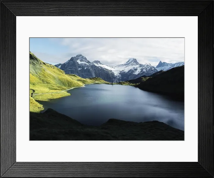 Framed Print : Picturesque view on Bachalpsee lake in Swiss Alps mountains. Snowy peaks of Wetterhorn, Mittelhorn and Rosenhorn on background. Switzerland Framed Print : Picturesque view on Bachalpsee lake in Swiss Alps mountains. Snowy peaks of Wetterhorn, Mittelhorn and Rosenhorn on background. Switzerland