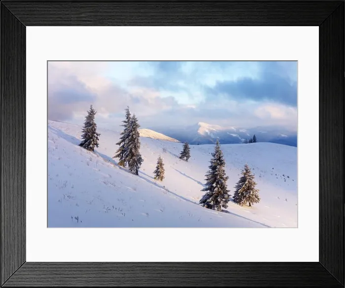 Framed Print : Fantastic orange winter landscape in snowy mountains glowing by sunlight. Dramatic wintry scene with snowy trees. Christmas holiday concept Framed Print : Fantastic orange winter landscape in snowy mountains glowing by sunlight. Dramatic wintry scene with snowy trees. Christmas holiday concept