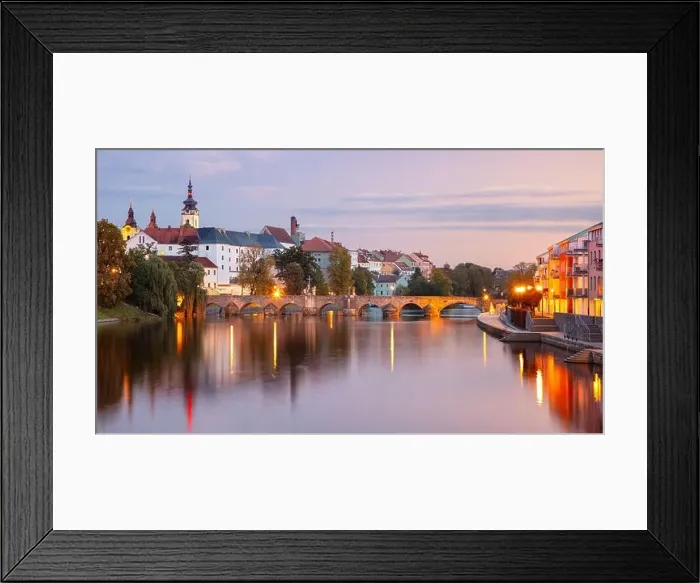 Framed Print : Pisek, Czech Republic. Panoramic cityscape image of Pisek with famous Stone Bridge at beautiful autumn sunset Framed Print : Pisek, Czech Republic. Panoramic cityscape image of Pisek with famous Stone Bridge at beautiful autumn sunset