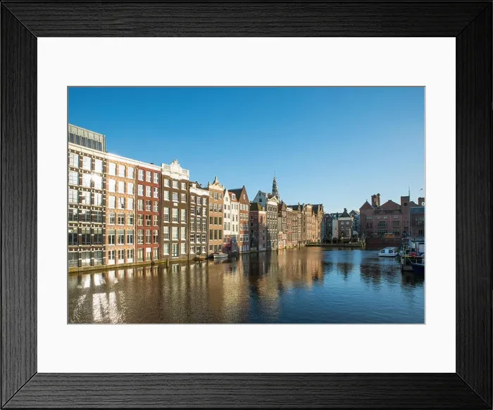 Framed Print : Amsterdam city view of Netherlands traditional houses with Amstel river in Amsterdam, Netherlands Framed Print : Amsterdam city view of Netherlands traditional houses with Amstel river in Amsterdam, Netherlands