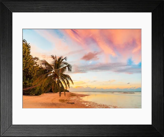 Framed Print : Sunset sunrise beach landscape. Amazing colors sky and calm sea water with palm trees over tranquil beach