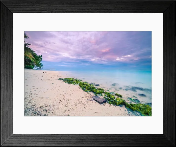 Framed Print : Tropical beach at sunset nature background. Moss on rocks with amazing colorful sky. Long exposure seascape with beach coastline