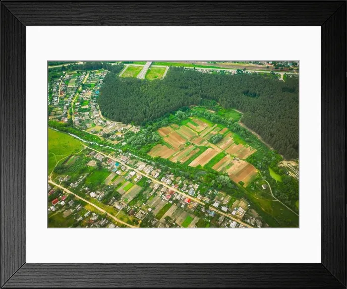 Framed Print : Aerial View Of Vegetable Gardens In Small Town Or Village. Skyline In Summer Evening. Village Garden Beds In Bird's-eye View Framed Print : Aerial View Of Vegetable Gardens In Small Town Or Village. Skyline In Summer Evening. Village Garden Beds In Bird's-eye View