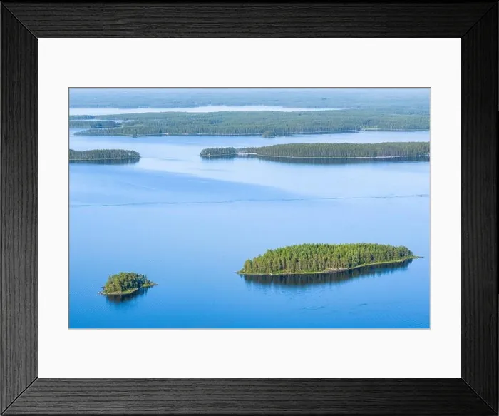 Framed Print : Scenic lake landscape with blue water and beautiful pine trees island at sunny summer day in National park Finland Framed Print : Scenic lake landscape with blue water and beautiful pine trees island at sunny summer day in National park Finland