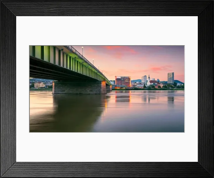 Framed Print : Linz, Austria. Cityscape image of riverside Linz, Austria at summer sunset with reflection of the city lights in Danube river Framed Print : Linz, Austria. Cityscape image of riverside Linz, Austria at summer sunset with reflection of the city lights in Danube river
