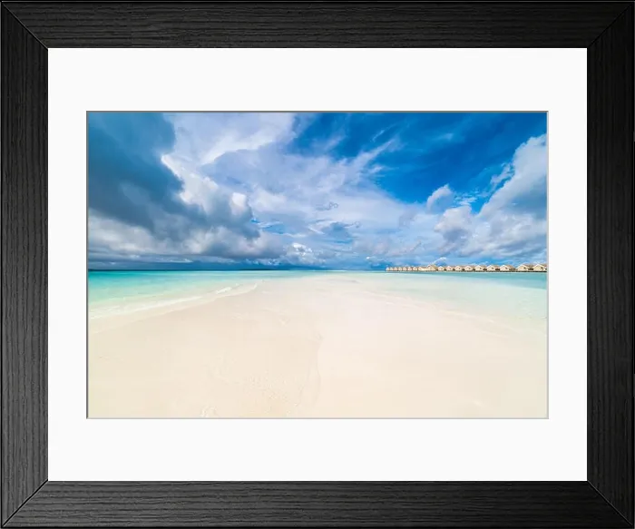 Framed Print : Summer landscape of perfect white sand beach and turquoise tropical ocean in Maldives with luxury water villas. Beach vacation and travel destination Framed Print : Summer landscape of perfect white sand beach and turquoise tropical ocean in Maldives with luxury water villas. Beach vacation and travel destination