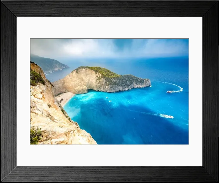Framed Print : Navagio bay and Ship Wreck beach in summer. The most famous natural landmark of Zakynthos, Greek island in the Ionian Sea Framed Print : Navagio bay and Ship Wreck beach in summer. The most famous natural landmark of Zakynthos, Greek island in the Ionian Sea