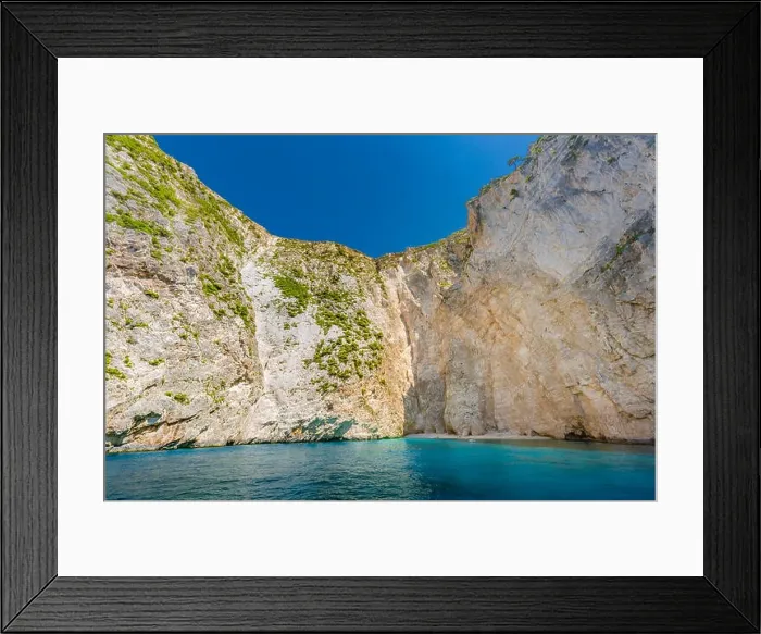 Framed Print : Greece, cliff landscape with sea as travel destination island with blue sky. Idyllic shoreline in Greece, Zakynthos Framed Print : Greece, cliff landscape with sea as travel destination island with blue sky. Idyllic shoreline in Greece, Zakynthos